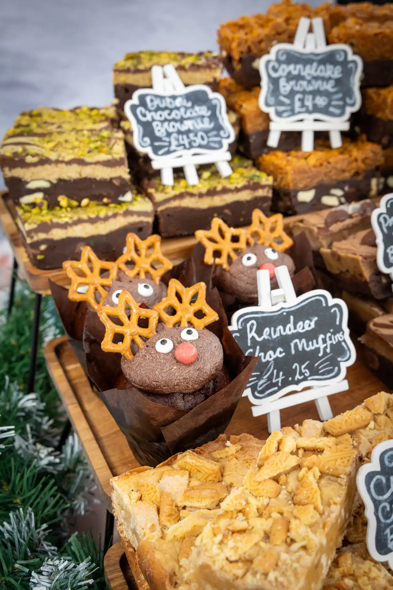 Festive bakes, brownies and reindeer treats on a cake stall at the Ashdon Christmas Market at the Rose & Crown