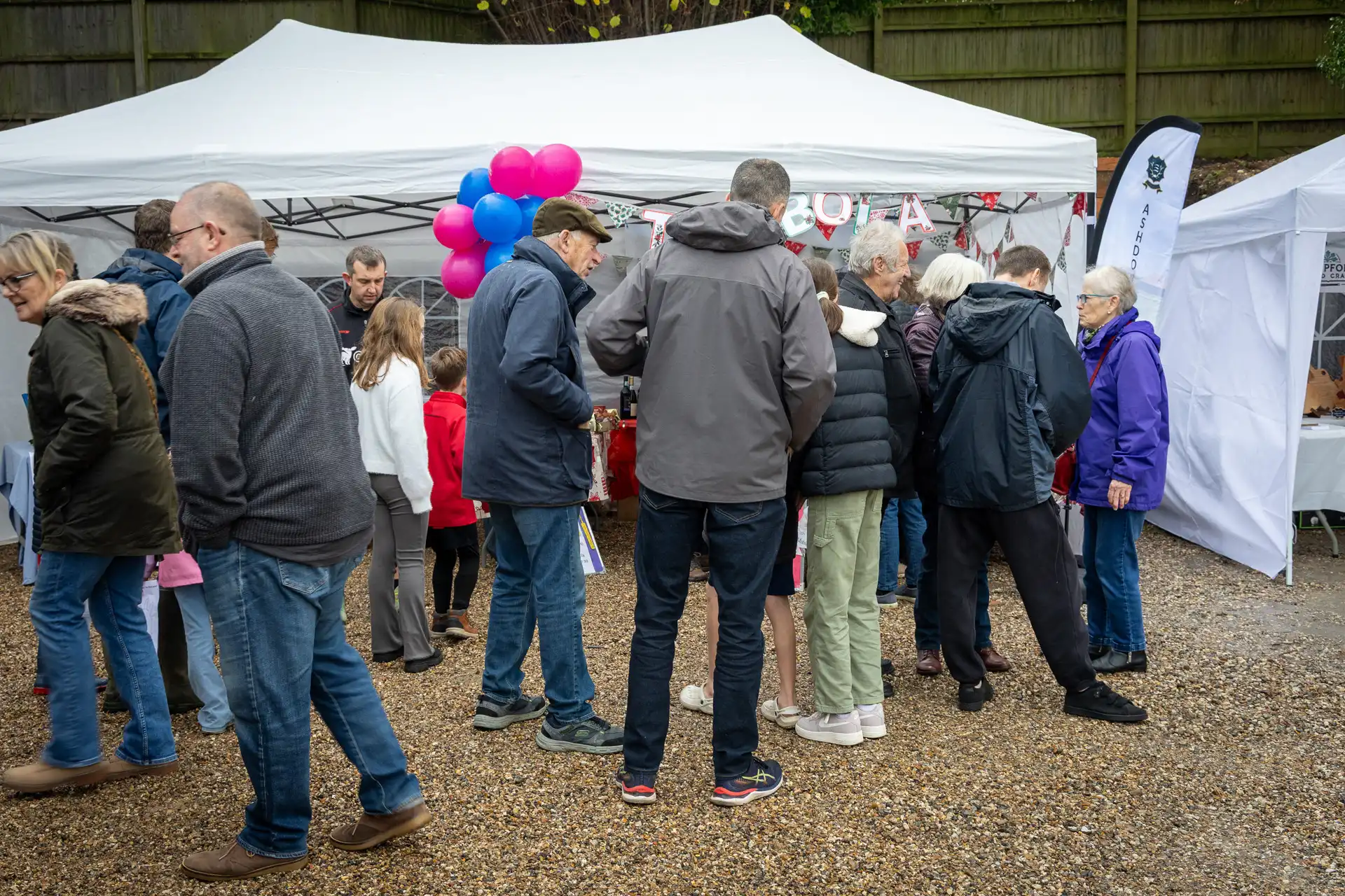 Visitors browsing the stalls at the Ashdon Christmas Market at the Rose & Crown